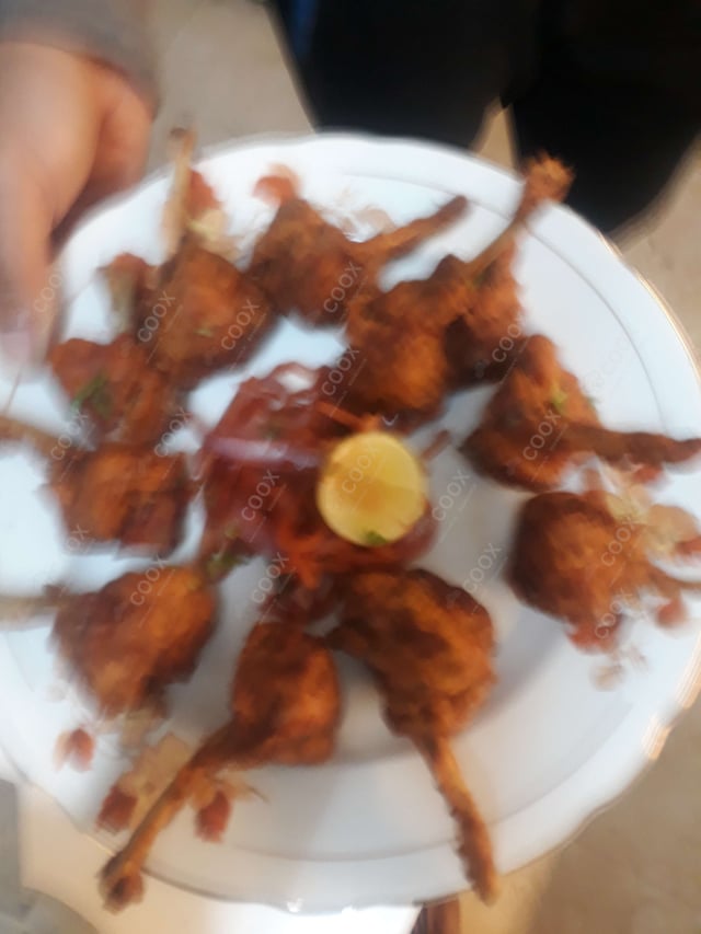 Delicious Chicken Lollipop prepared by COOX