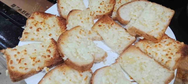 Delicious Garlic Bread with Cheese prepared by COOX