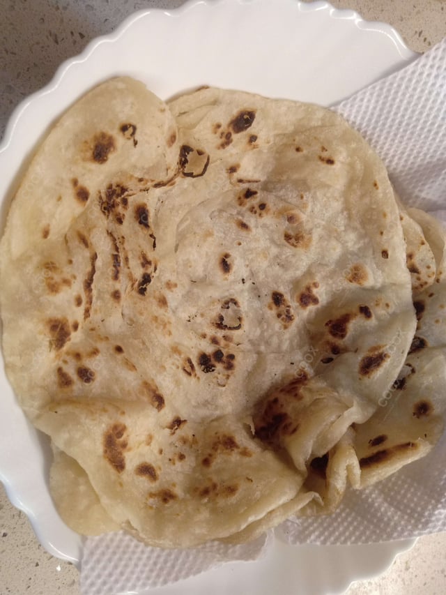 Delicious Lachha Parathas prepared by COOX