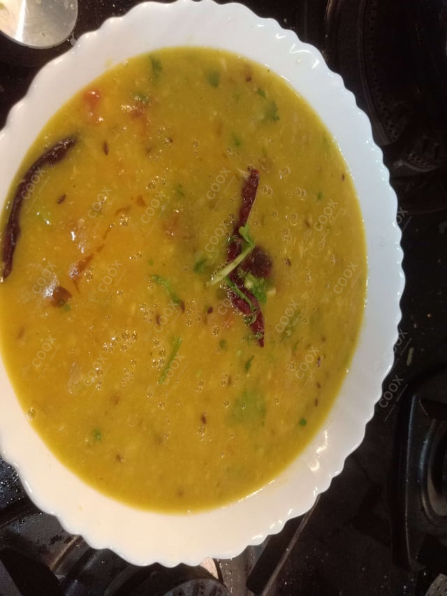 Delicious Dal Tadka prepared by COOX