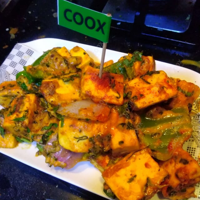 Delicious Paneer Tikka prepared by COOX