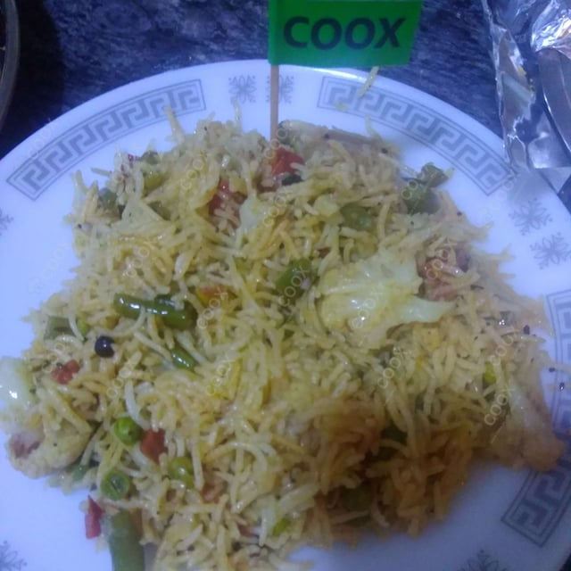 Delicious Veg Biryani prepared by COOX