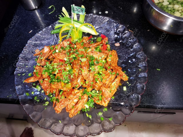 Delicious Chilli Lotus Stem prepared by COOX