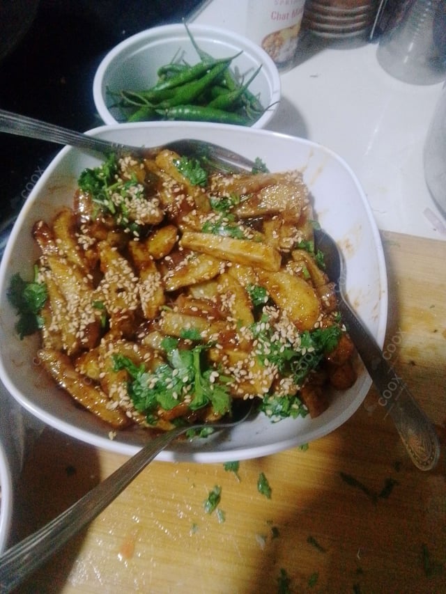 Delicious Honey Chilli Potato prepared by COOX