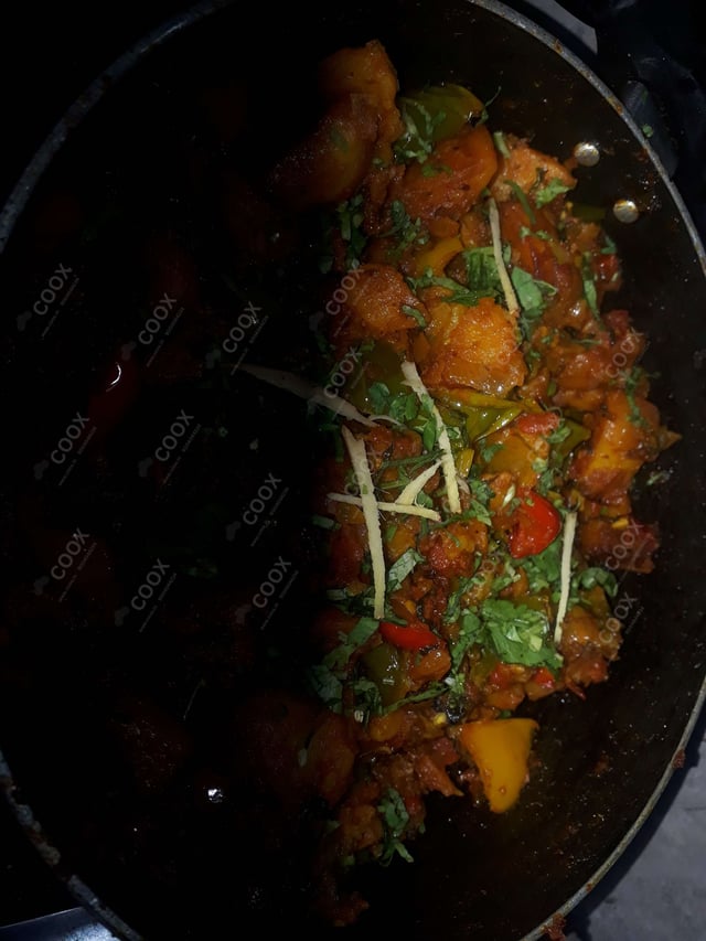 Delicious Aloo Shimla Mirch prepared by COOX