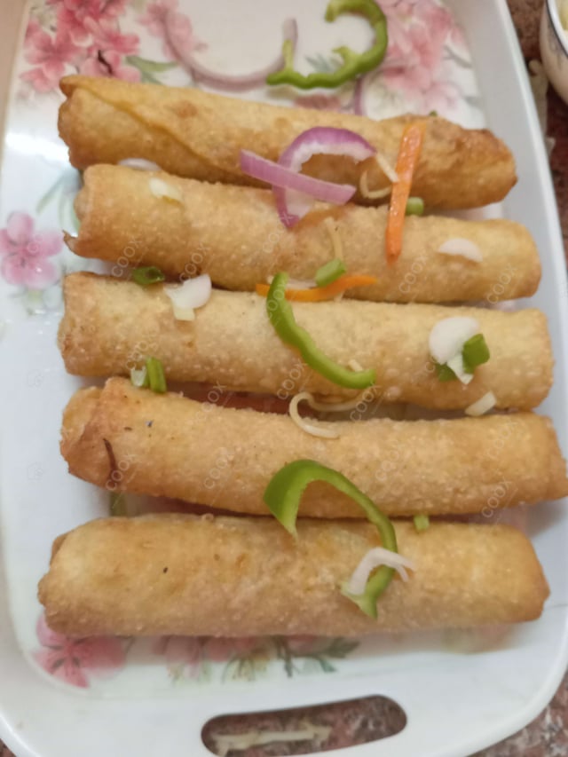 Delicious Veg Spring Rolls prepared by COOX