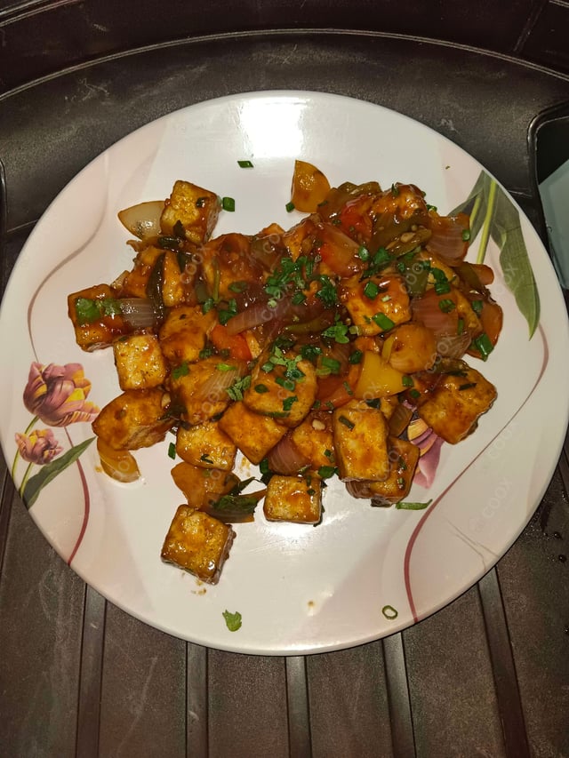 Delicious Chilli Paneer (Dry) prepared by COOX