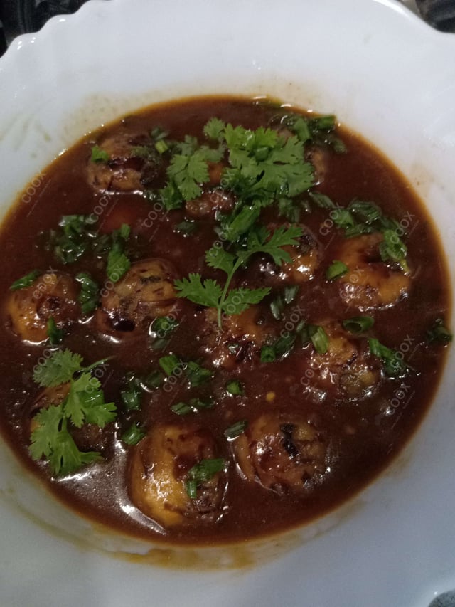 Delicious Veg Manchurian (Gravy) prepared by COOX