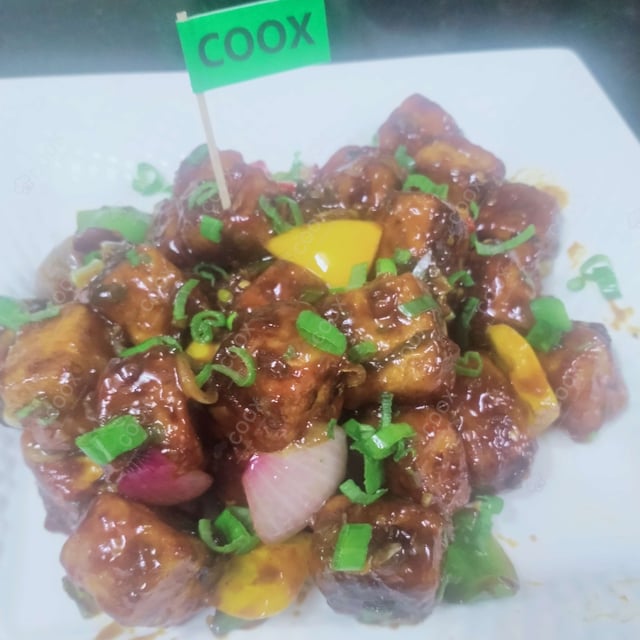 Delicious Chilly Paneer prepared by COOX