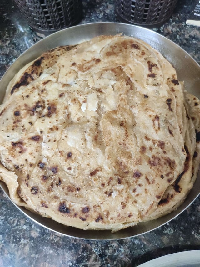 Delicious Lachha Parathas prepared by COOX