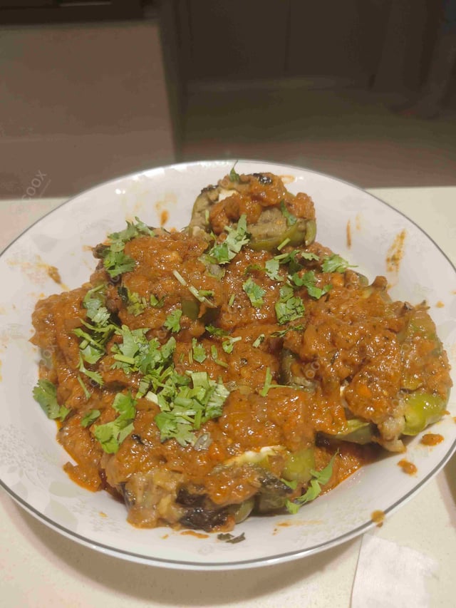 Delicious Bharwa Shimla Mirch prepared by COOX