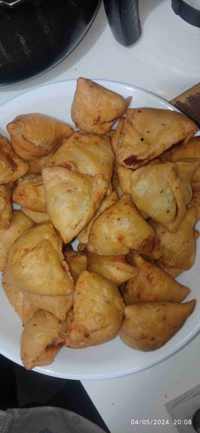 Delicious Mini Samosas prepared by COOX