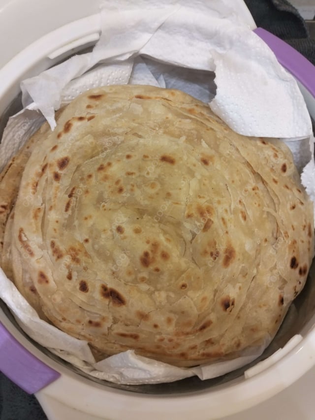 Delicious Lachha Paranthas prepared by COOX