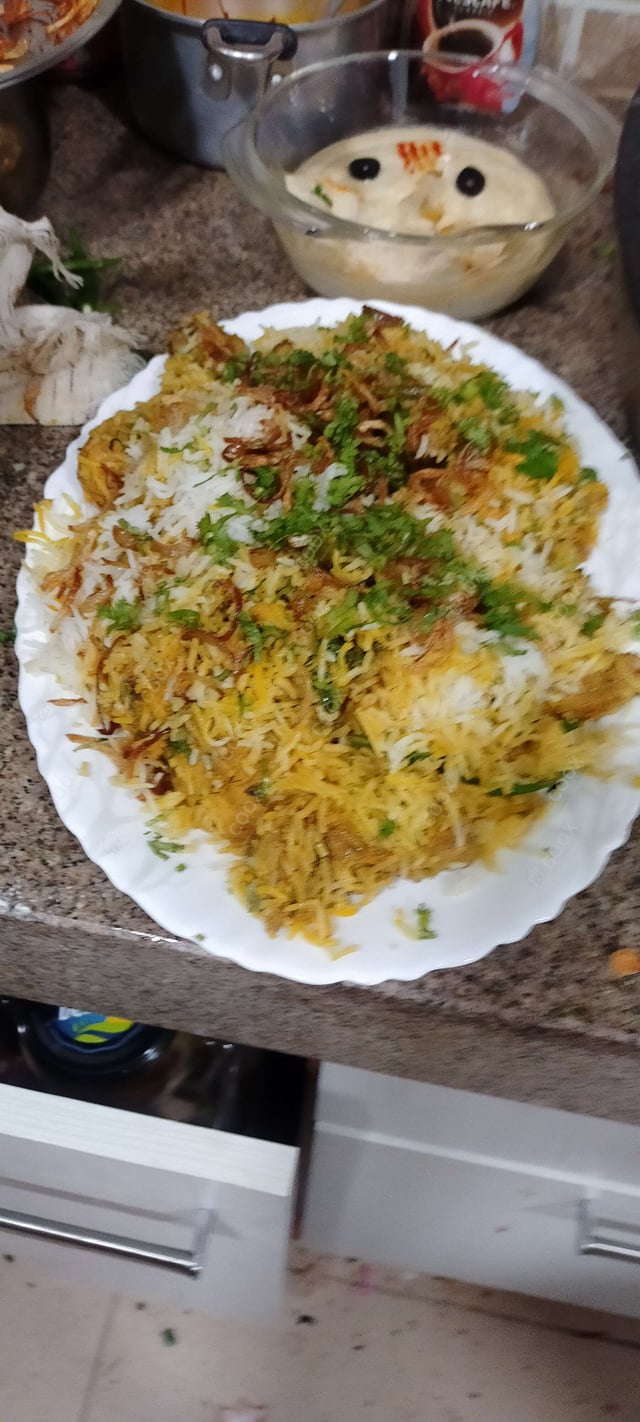 Delicious Chicken Biryani prepared by COOX