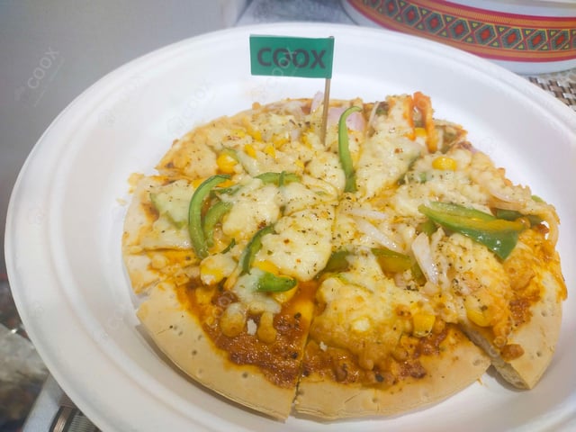 Delicious Veg Pizza prepared by COOX