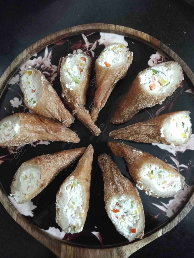 Delicious Dahi ke Sholey prepared by COOX