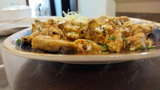 Delicious Tandoori Malai Chaap (Dry) prepared by COOX