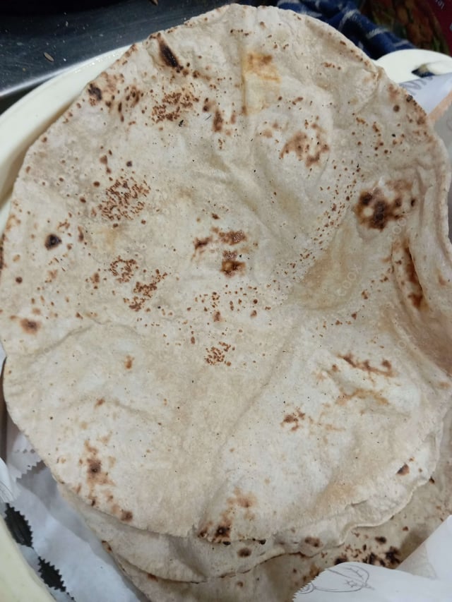 Delicious Tawa Rotis prepared by COOX