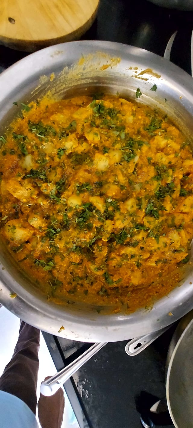 Delicious Dum Aloo prepared by COOX