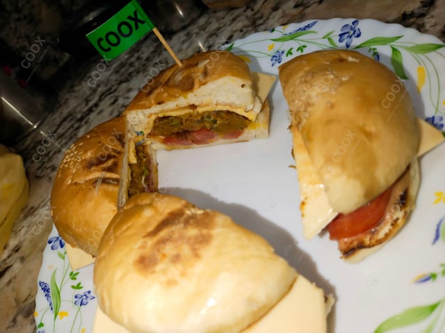 Delicious Mini Veg Burgers prepared by COOX