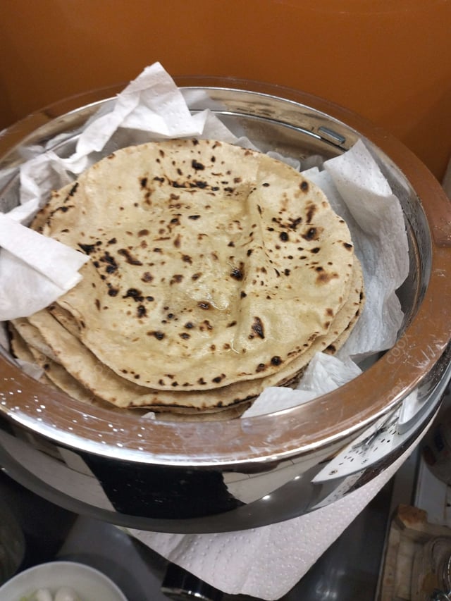 Delicious Tawa Rotis prepared by COOX