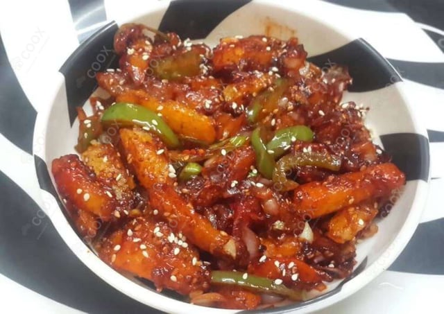 Delicious Honey Chilli Potato prepared by COOX