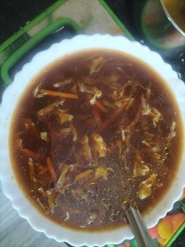 Delicious Vegetable Manchow Soup prepared by COOX