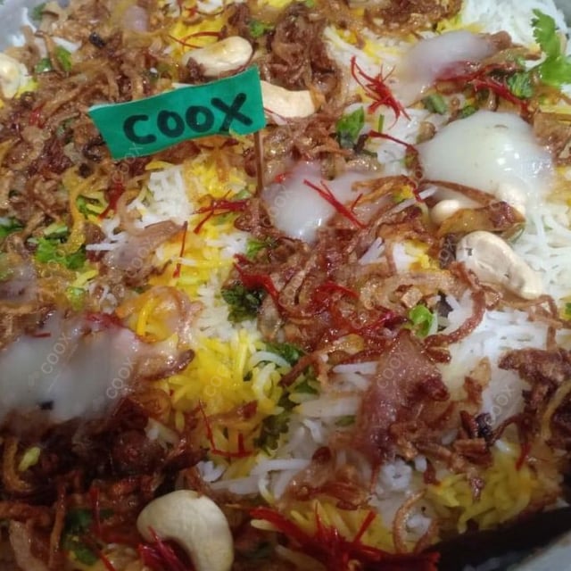 Delicious Veg Biryani prepared by COOX