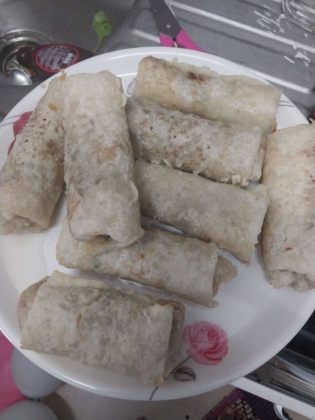 Delicious Veg Spring Rolls prepared by COOX