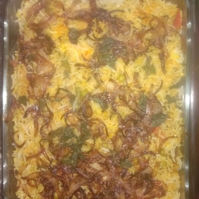 Delicious Veg Biryani prepared by COOX