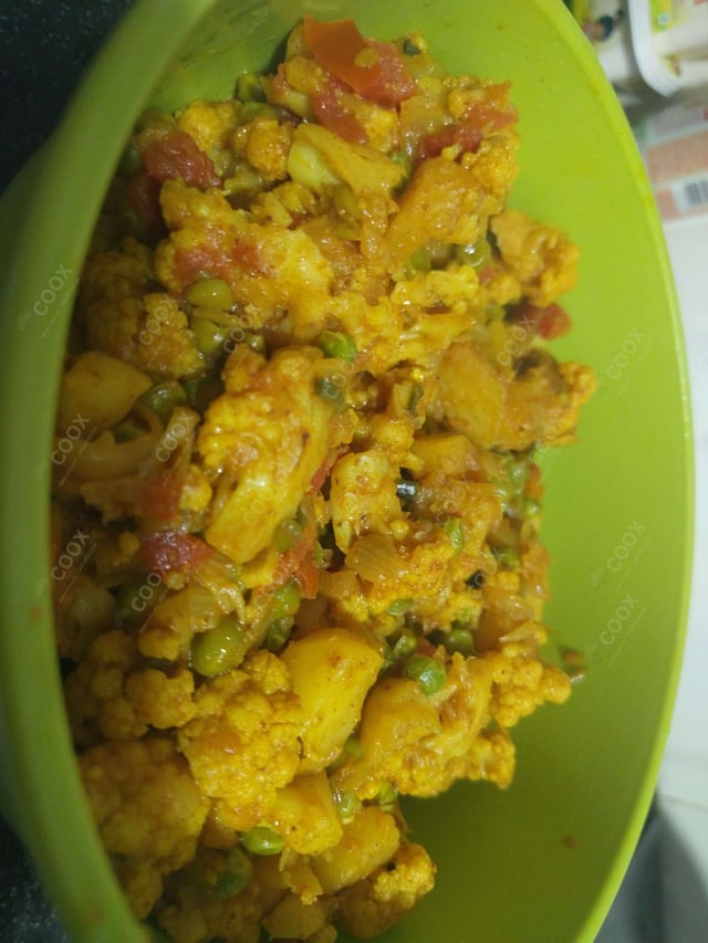 Delicious Gobhi Matar prepared by COOX