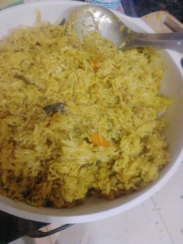 Delicious Veg Biryani prepared by COOX