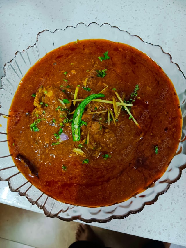 Delicious Mutton Rogan Josh prepared by COOX