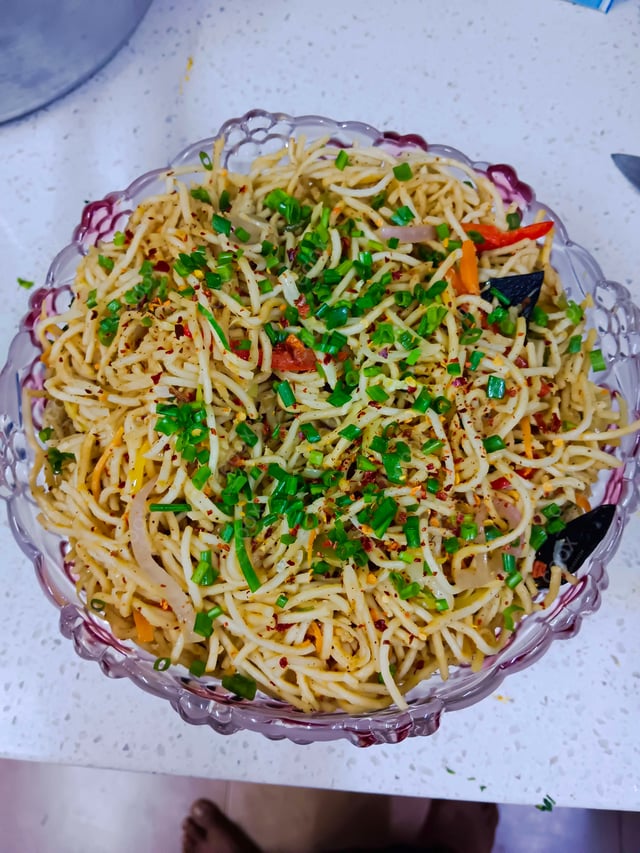 Delicious Chilli Garlic Noodles prepared by COOX