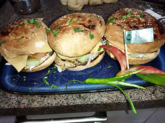 Delicious Mini Veg Burgers prepared by COOX