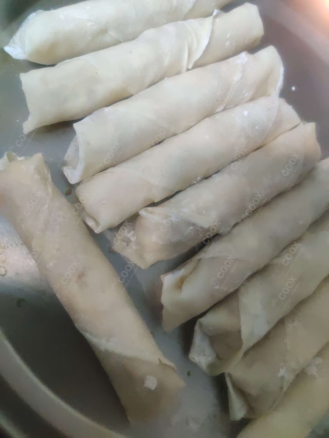 Delicious Veg Spring Rolls prepared by COOX