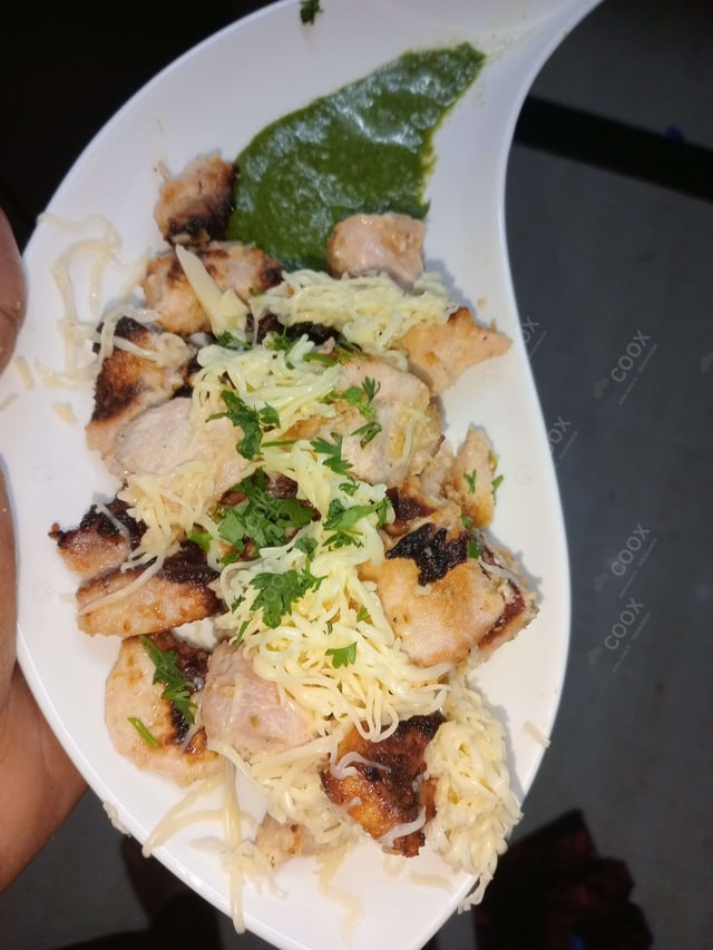 Delicious Murgh Malai Tikka prepared by COOX