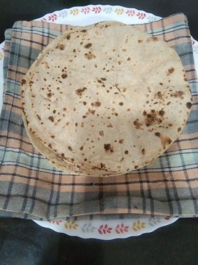 Delicious Tawa Rotis prepared by COOX