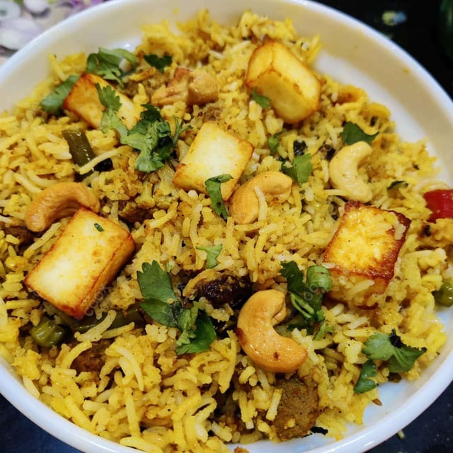 Delicious Veg Biryani prepared by COOX