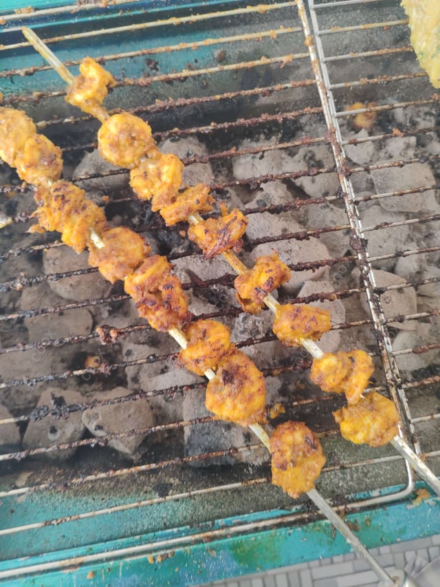 Delicious Tandoori Prawns prepared by COOX