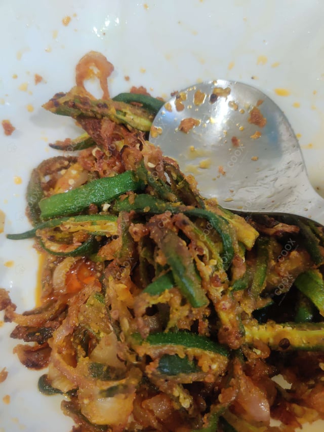 Delicious Kurkuri Bhindi prepared by COOX