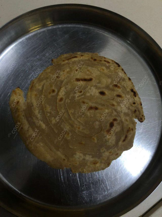 Delicious Lachha Parathas prepared by COOX