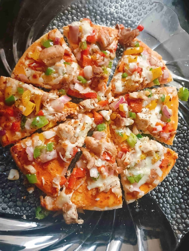 Delicious Chicken Pizza prepared by COOX