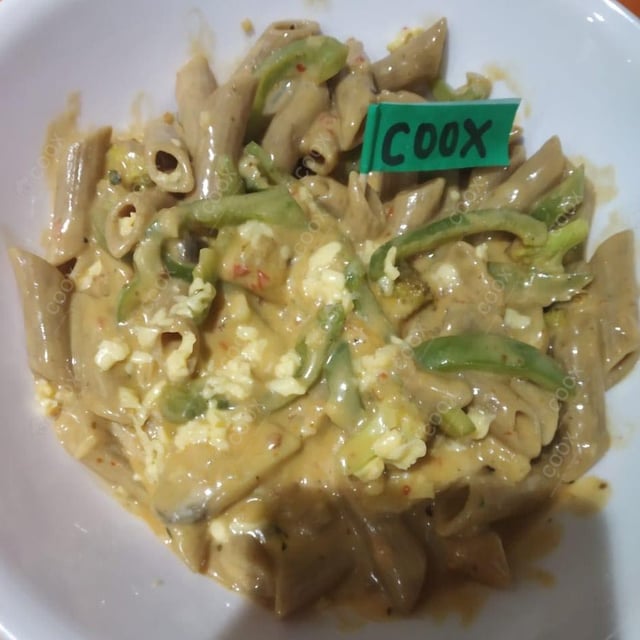 Delicious Veg Pasta in White Sauce prepared by COOX