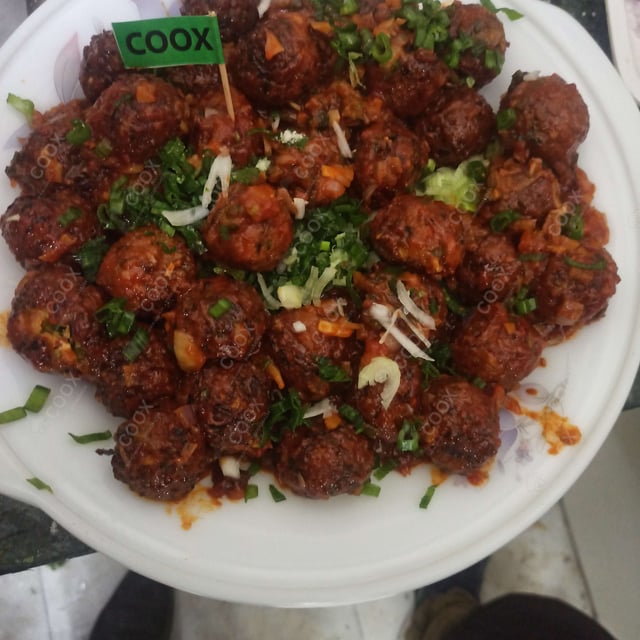 Delicious Veg Manchurian (Dry) prepared by COOX