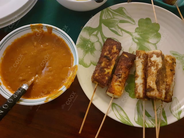 Delicious Thai Paneer Satay prepared by COOX