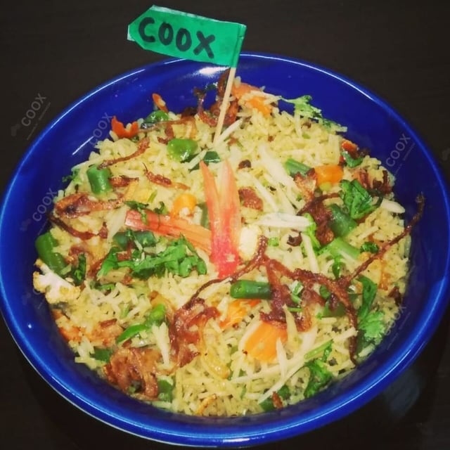 Delicious Veg Biryani prepared by COOX