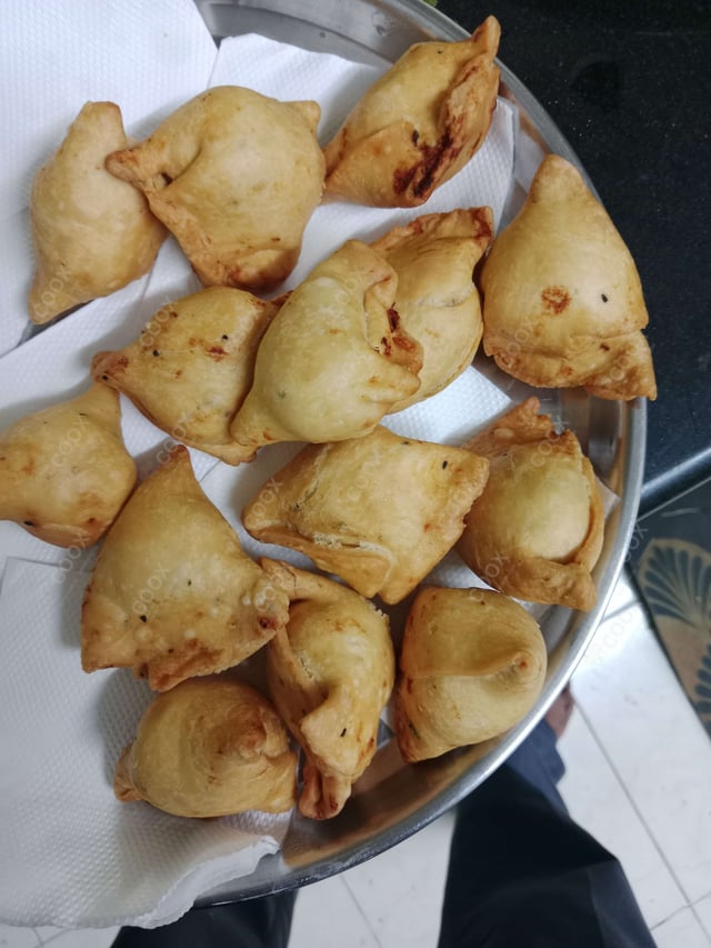 Delicious Mini Samosas prepared by COOX