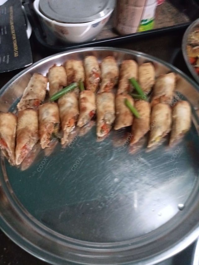 Delicious Veg Spring Rolls prepared by COOX