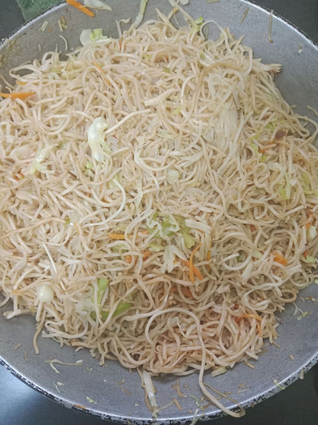 Delicious Veg Hakka Noodles prepared by COOX